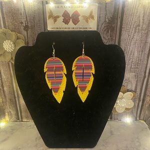 Handmade faux leather earrings.